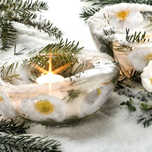 Lantern made of ice with Christmas Rose flowers for the winter.